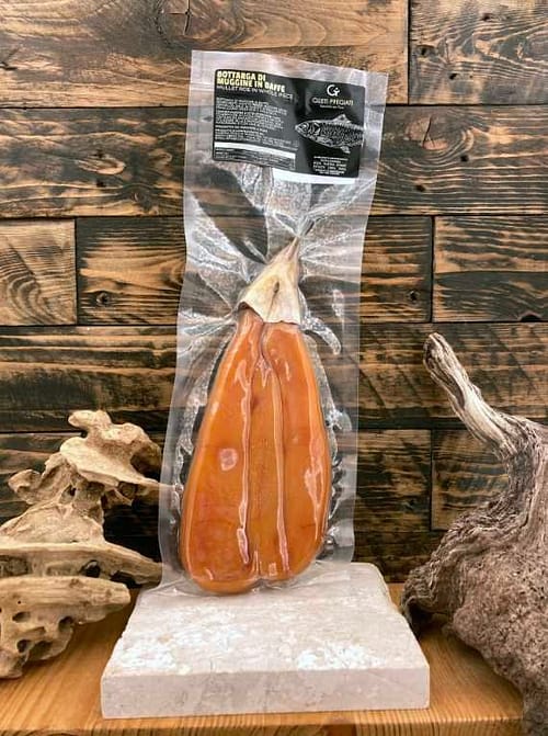 bottarga-tharros-pesca-2.jpg Bottarga di muggine in baffa (Stagno di Cabras) 300g